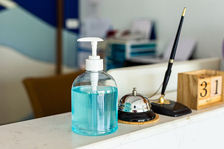 Reception desk with sanitizer